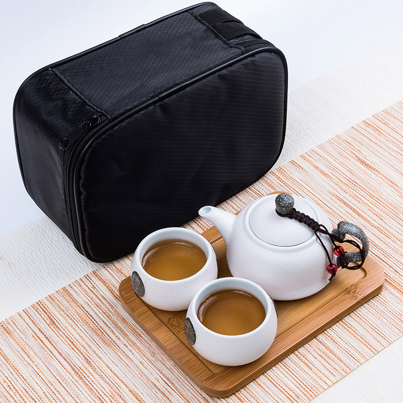 A crack cup pot 2 travel two cups of tea A portable set of snowflakes kung fu ceramic teapot is suing travel package