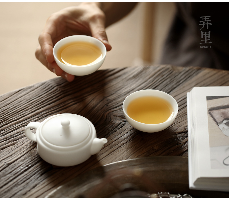 Travel tea set ceramic cups kung fu dehua white porcelain cup to crack a pot of two cups of Japanese portable teapot