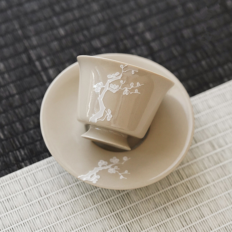 Jingdezhen anaglyph carved name plum flower plant ash to restore ancient ways small teacup saucer set of household ceramic thin foetus sample tea cup
