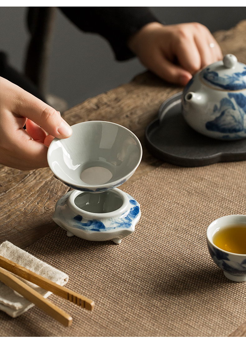 Jingdezhen hand - made) ceramic filter filter kung fu tea set of blue and white porcelain tea tea with parts across indicates the tea