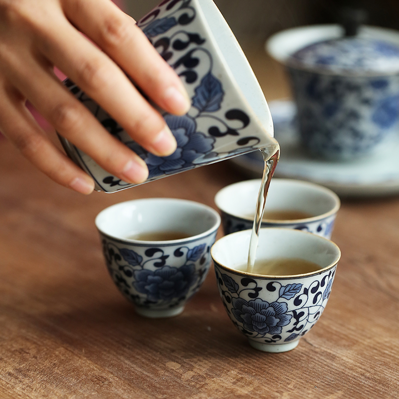 Jingdezhen hand - made porcelain tea set suit household small sets of kung fu tea cup tureen tea pot dry terms plate