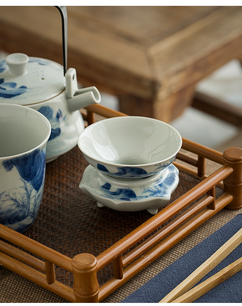 Jingdezhen hand - made) ceramic filter filter kung fu tea set of blue and white porcelain tea tea with parts across indicates the tea