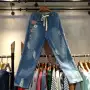 D1 dây thun mới dây rút hoa thêu quốc gia lỗ gió denim quần quần nữ 0,45 quần jean nữ ống suông hàn quốc