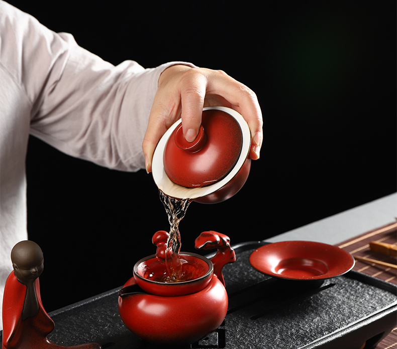 Have the ancient fair keller coarse pottery kung fu tea set home office ceramic tea accessories tea sea points device and a cup of tea