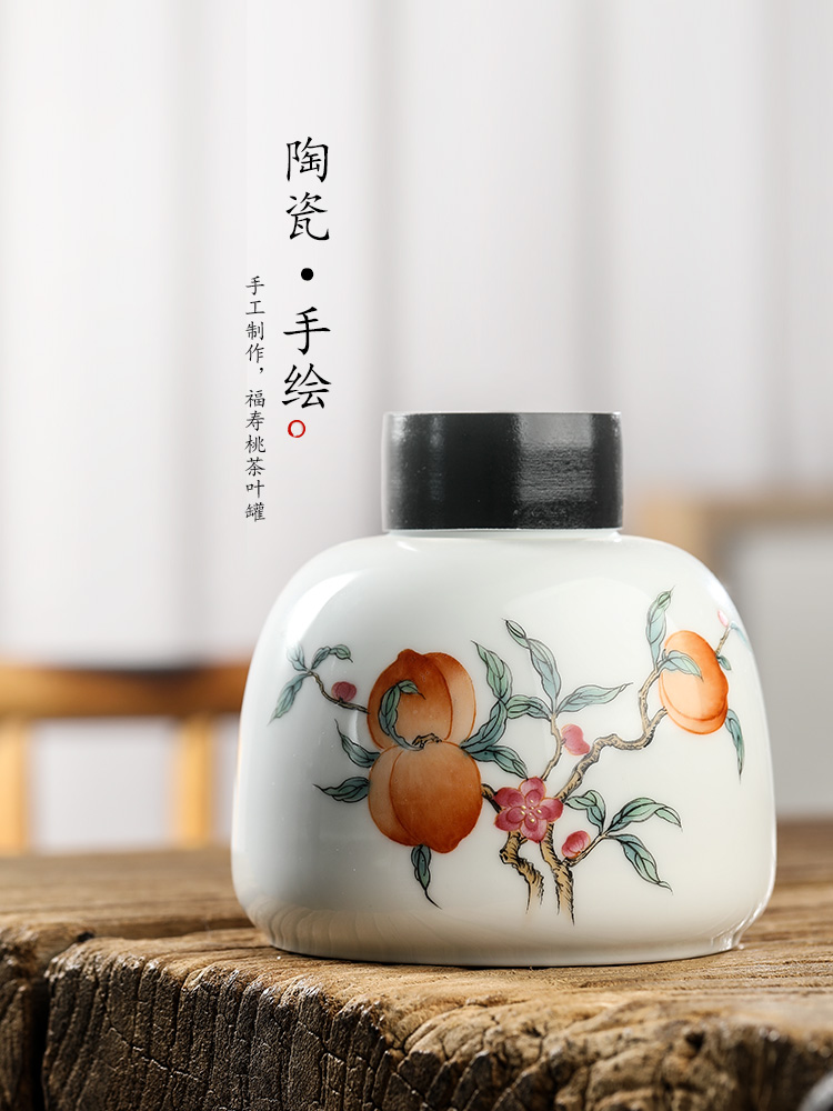 Jingdezhen pure manual white porcelain tea pot hand - made peach ceramic seal pot home tea tea storage tanks