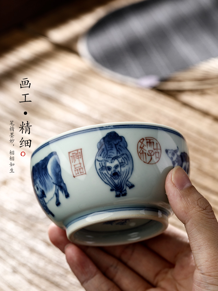 Jingdezhen blue and white master cup single CPU kung fu tea set sample tea cup pure manual single hand - made zodiac WuNiu tea urn