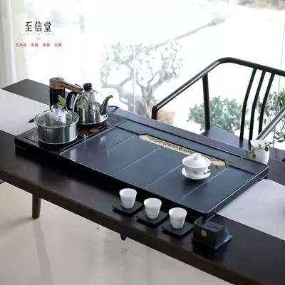 The whole piece of Wujin Stone tea tray household tea set integrated automatic drainage whole set of induction cooker large stone Tea Sea