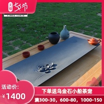 Zhixintang Master handmade natural black gold stone tea tray Simple whole stone tea table Household stone tea sea tea set