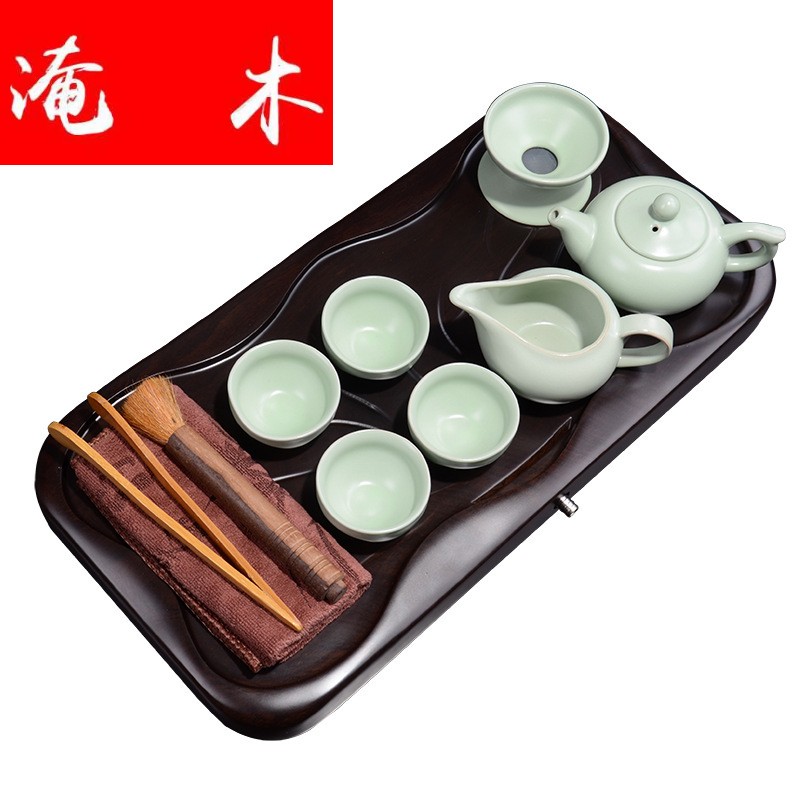 Flooded ebony wood real wood tea tray, xiao - he leaf black purple sand your up hand - made celadon tea set