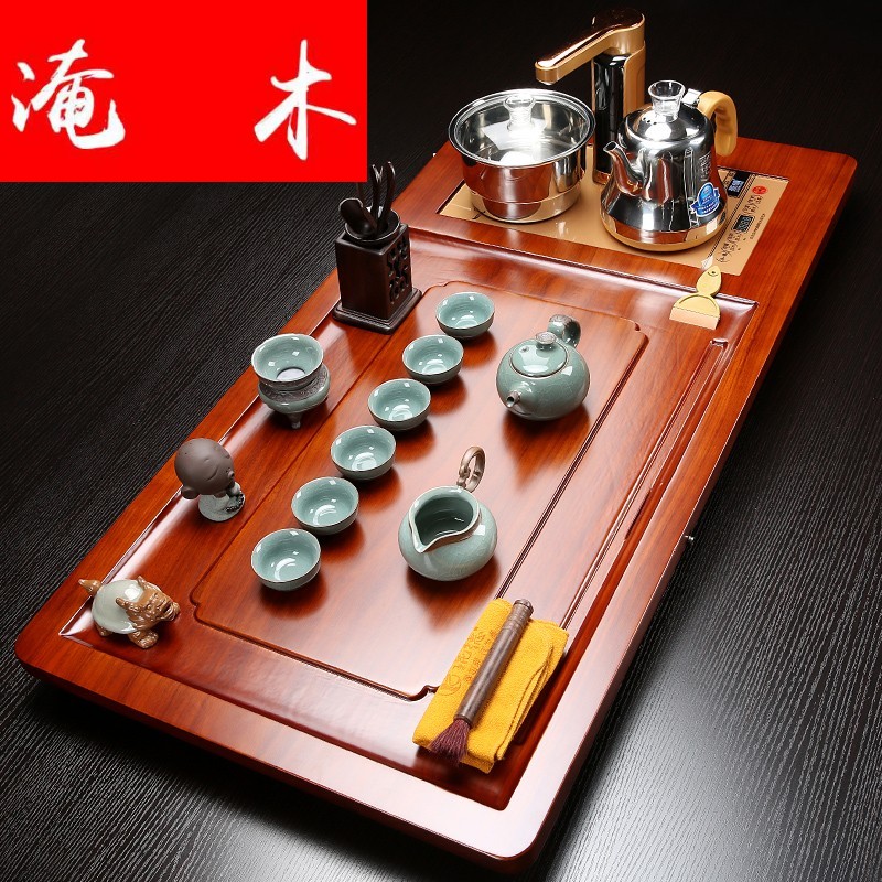 Submerged wood blocks hua limu tea tray and four automatic induction cooker purple ceramic kung fu tea set