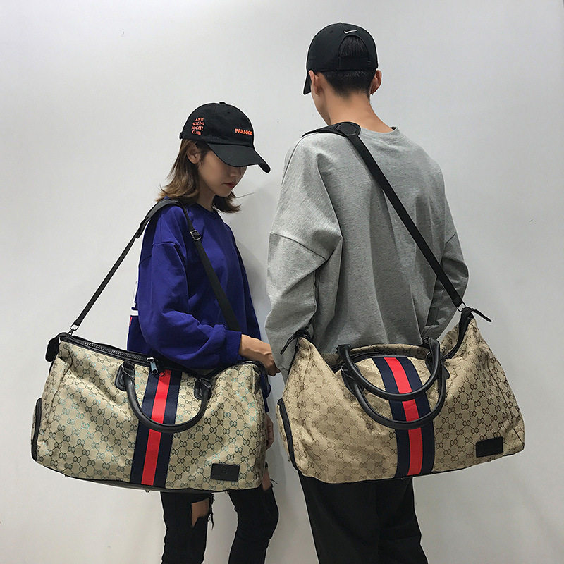 Short Haul Light Letters Large Capacity Color Bar Collision travel bag Men and women Single-shoulder Shoe Baggage Baggage Bag Tide