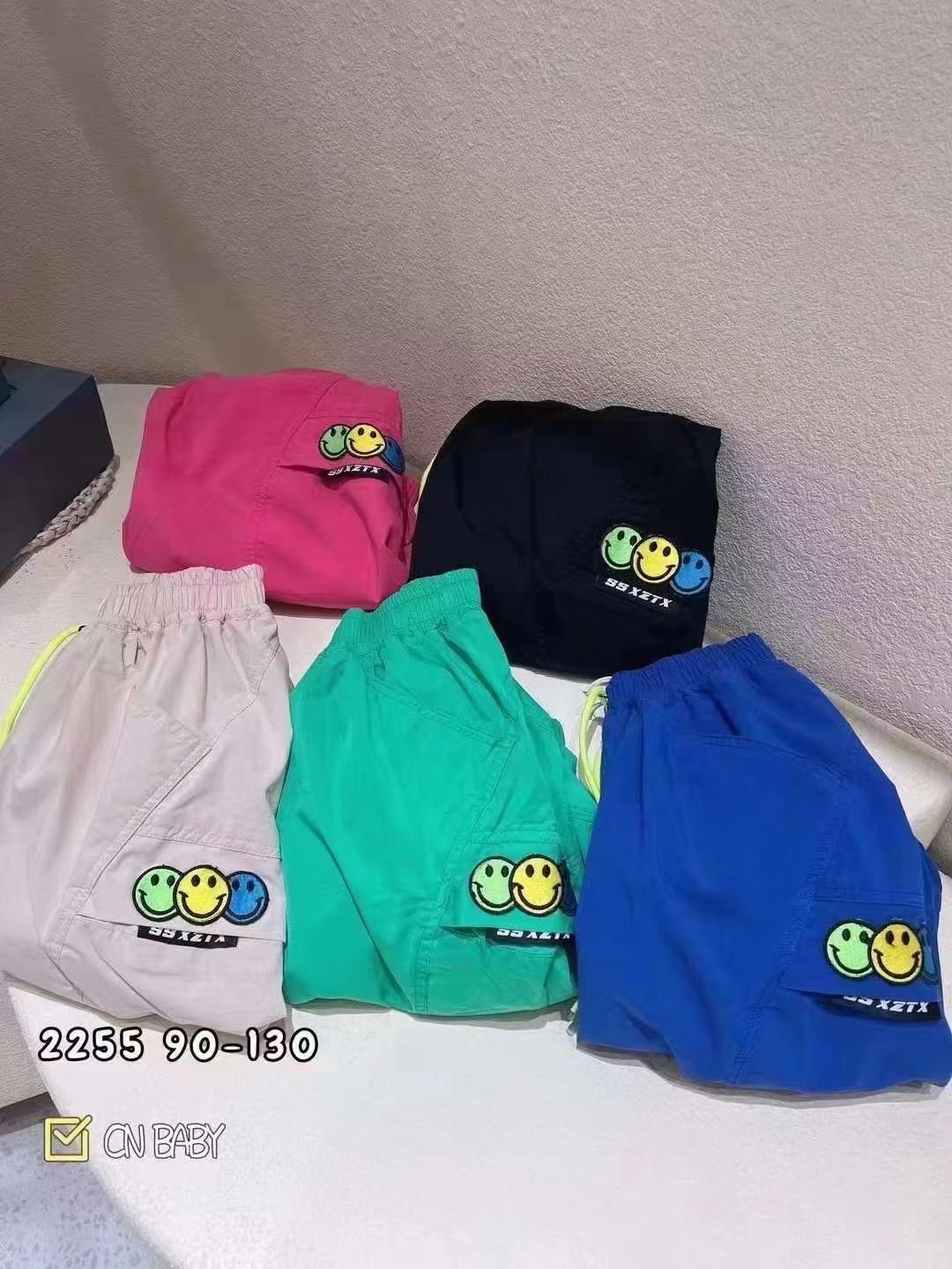 Small classmates and children in the spring and summer of 2022 thin section breathable smiling face loose casual trousers 2255