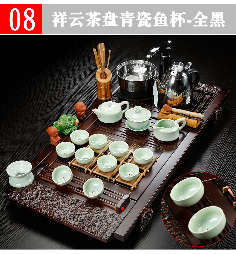 Back on solid wood tea tray was four unity of household ceramic kung fu tea set of a complete set of automatic tea set