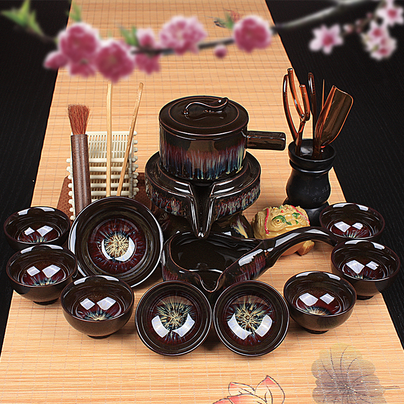 Lazy stone mill tea set ceramic violet arenaceous household kung fu suit all semi - automatic hot tea cups creative tea POTS