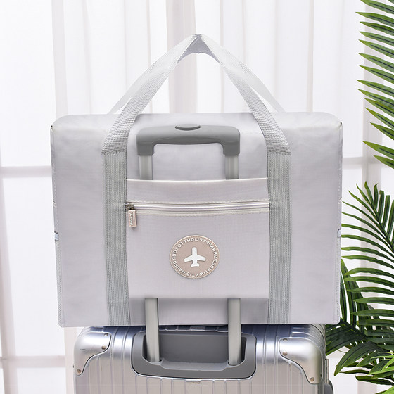 Large-capacity travel bag women's foldable luggage waiting for delivery bag storage bag portable hand-held simple short-distance trolley bag