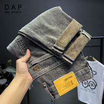 Jeans mens 2022 new autumn and winter thick section hole tide brand nine points slim small feet Korean version of the trend pants men
