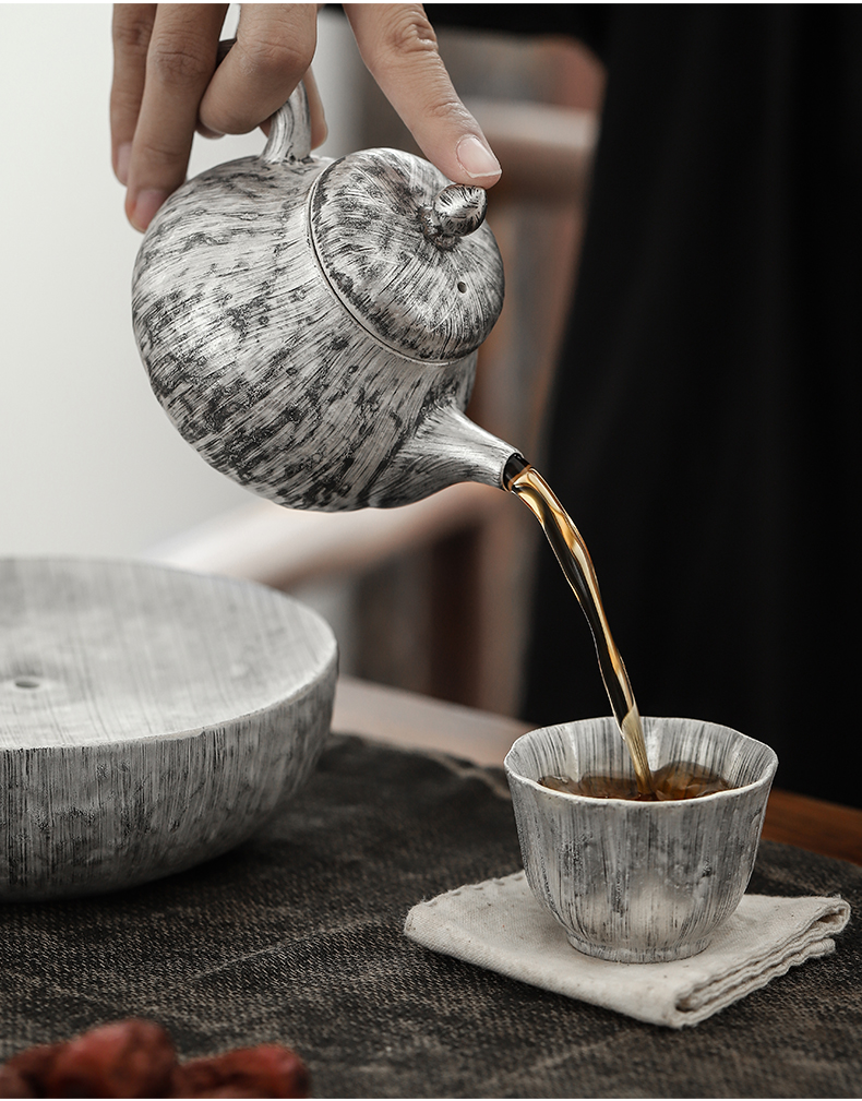 By mud coppering. As silver teapot pure manual brush which Japanese filter tea gifts household ceramics kung fu tea set single pot