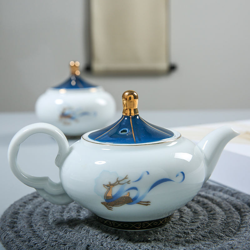 Kung fu tea set suit household contracted light key-2 luxury new silk road jingdezhen ceramic Kung fu tea kettle upscale gift box