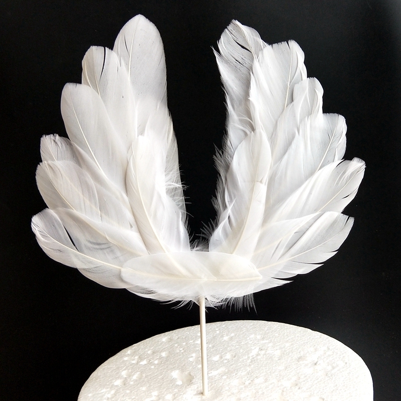 Angel feather wings black pink feather decorated dessert tablet with birthday cake dressed cake