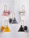 Modern creative wall lamp living room background wall aisle corridor lamp Nordic macaron new bedroom bedside wall lamp