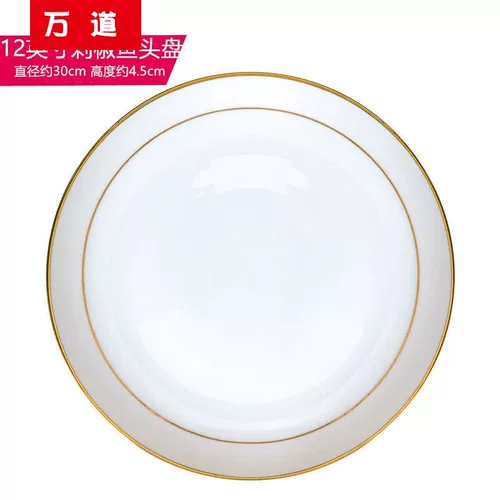 Нарезанный блюда с нарезанными блюдами, домом -большие 12 -дюймовые круглые чистые белые большие тарелки отель отель на пару парированных рыб