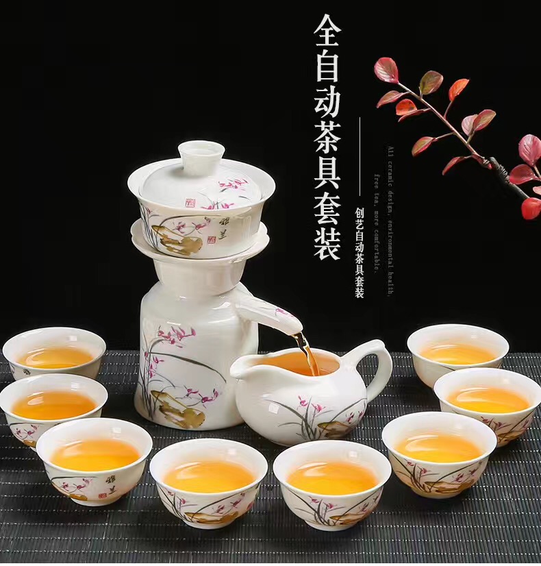 A complete set of ceramic semi - automatic lazy time of blue and white porcelain tea set suits for all artesian hot tea. Preventer gift boxes