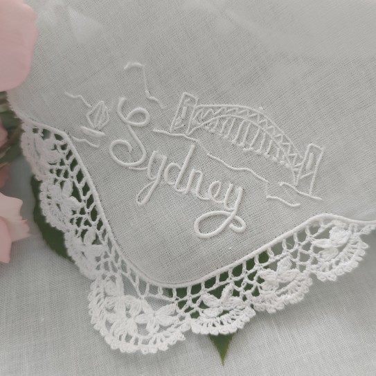 Two styles of white pure cotton yarn handkerchiefs/napkins with hand-crocheted embroidery.