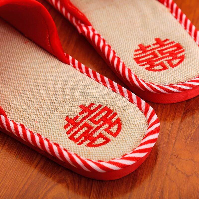 Husband and wife wedding slippers couple happy red a newly married wedding home indoor wedding creative summer