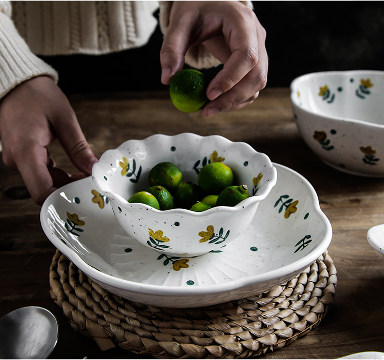 Individuality creative coarse pottery household utensils Japanese ears pan express waves under the glaze color floret rice bowls plates