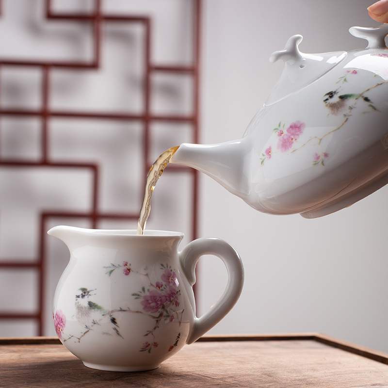 Jingdezhen flagship store of ceramic tea set home sitting room kung fu tea water peach blossom put eight head of a complete set of tea service