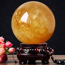 Natural yellow crystal ball swinging piece original stone processing home living room desk surface furnishing Qiao relocating gifts