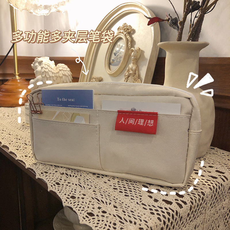 Original small crowdpen pouch ins high face value Korean version Large capacity Lead pen case Advanced sense creative minimalist stationery bag woman