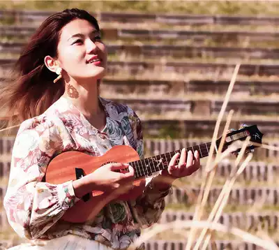 KAKA KAKA 30D peach blossom wood veneer ukulele beginner 23 inch small guitar children female male