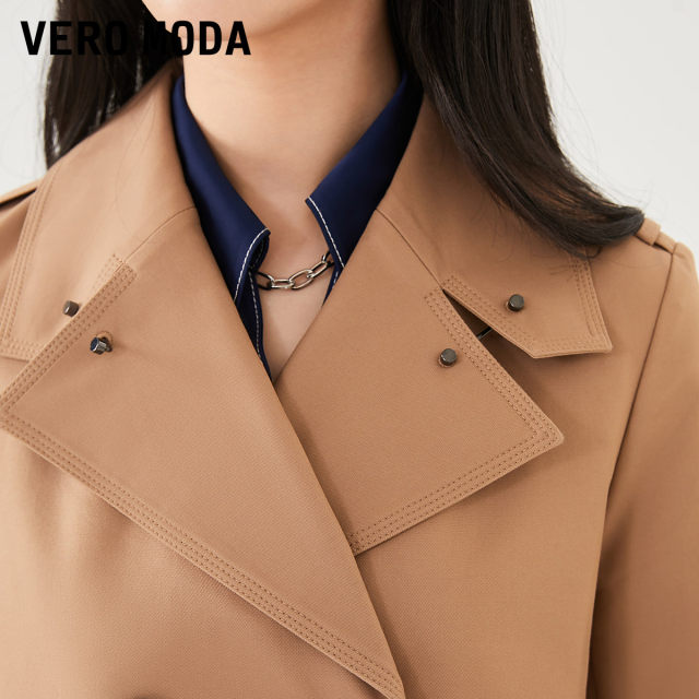 VeroModa windbreaker 2024 ພາກຮຽນ spring ແລະ summer ຮູບແບບໃຫມ່ແອວ lapel ຍາວກາງສີແຂງ commuter coat ອັງກິດສໍາລັບແມ່ຍິງ