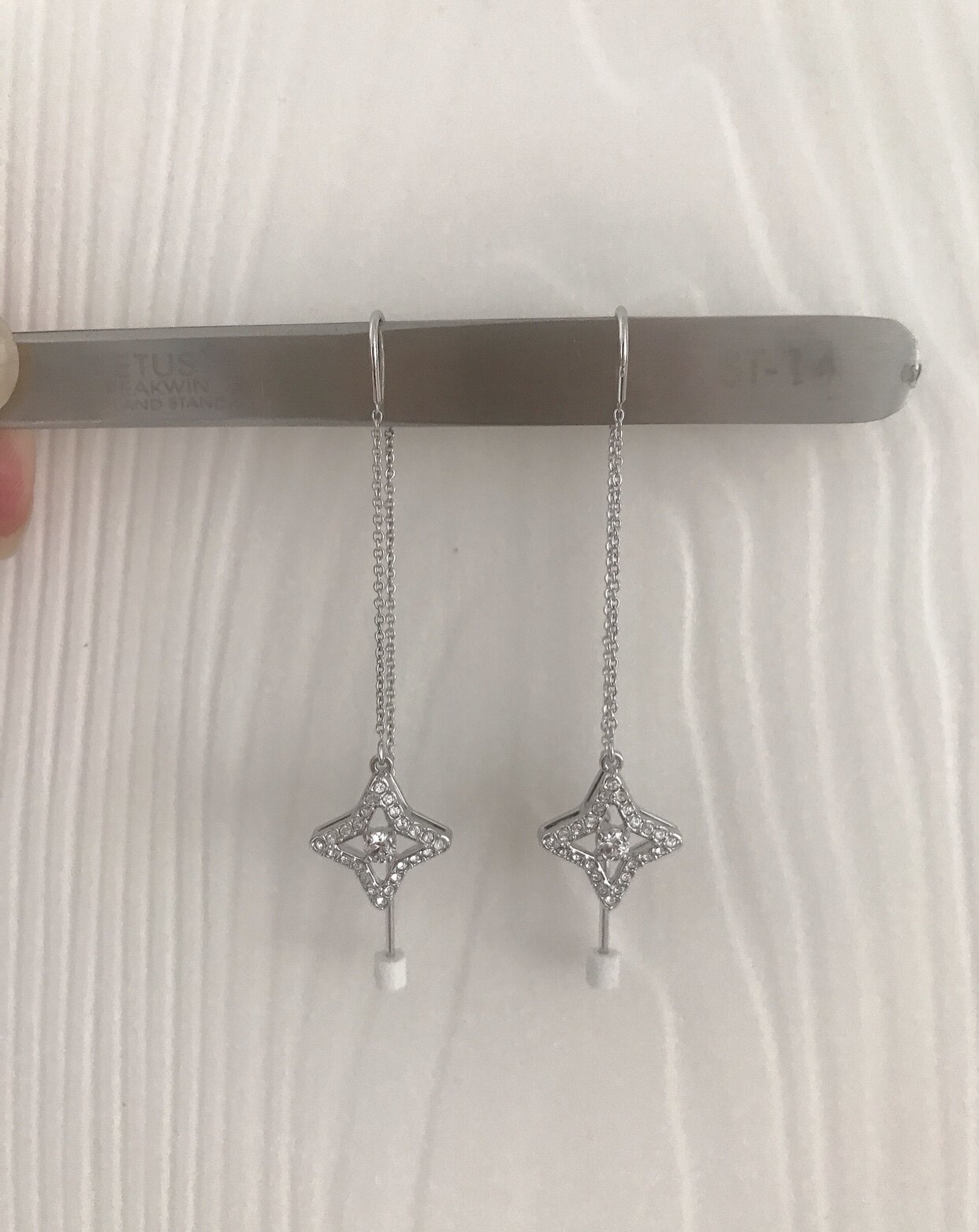 Spot throbbing star crystal earrings 5349665 warranty
