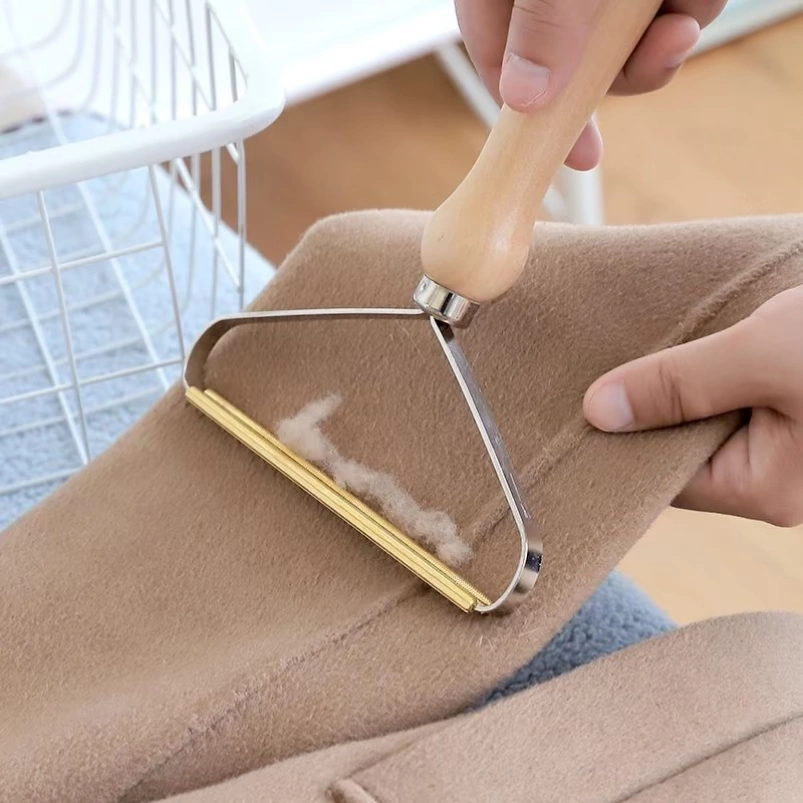 Giặt khô đặc biệt đồng cạp lông len tinh khiết tẩy lông bằng len nhân tạo thủ công cạo lông máy cạo lông không làm tổn thương quần áo - Hệ thống giá giặt