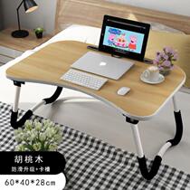 The simple outdoor students of the small table in the bed can fold the simple bedroom of the mini table in their home