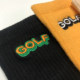 Golf font embroidery ຝ້າຍບໍລິສຸດກິລາກາງ calf socks ດູໃບໄມ້ລົ່ນແລະລະດູຫນາວຖະຫນົນຄົນອັບເດດ: ຍີ່ຫໍ້ຄູ່ນ່ຶກາຕູນຫຼັກຊັບສໍາລັບຜູ້ຊາຍແລະແມ່ຍິງ