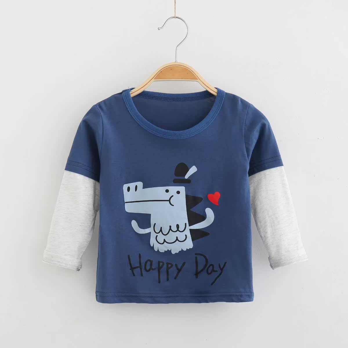 Chàng trai t-shirt dài tay áo 2019 mùa xuân và mùa thu mới baby khí nước ngoài bông nối tay áo đáy in hit triều đứa trẻ.