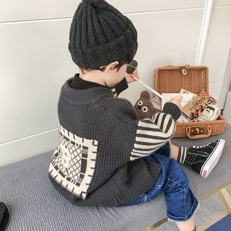 Boy's autumn clothing Han version handsome boy clothing 2022 new middle and children knit cardiovert sweater net red laced jacket