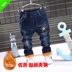 Mùa đông cộng với nhung dày quần jean trẻ em cộng với quần cotton bé trai có thể mở quần chân bé gái quần dài 1-7