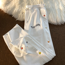 Neresum Joker pants button is a love shape of the breasted sports casual pants couples men and women with the same pants