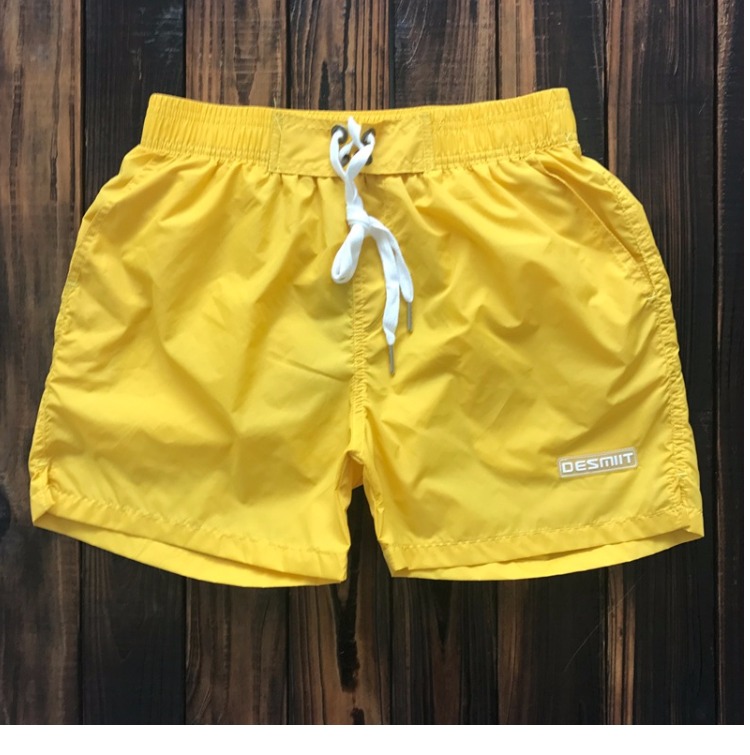 Đồ bơi nam quần quad quần khô nhanh bãi biển rắn thể thao màu chạy bộ loose kỳ nghỉ bên bờ biển quần short với lót quần đi biển tập the	