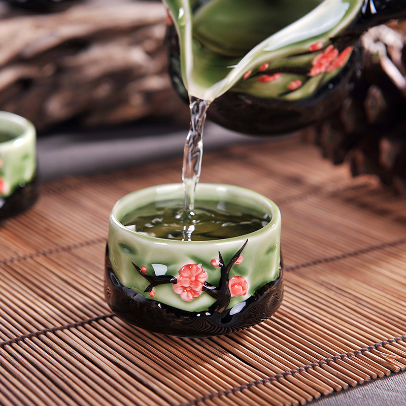 Jingdezhen ceramic tea set manually gift hand - made kung fu tea cups and heat insulation of a complete set of green porcelain tea set