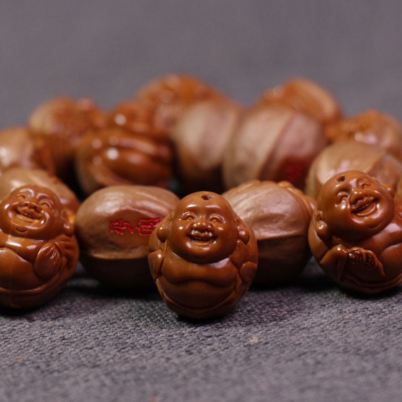 Su Gong Zhoushan olive core carving male and female hand string famous hand-carved Meilin iron core raw leather coated Maitreya Buddha