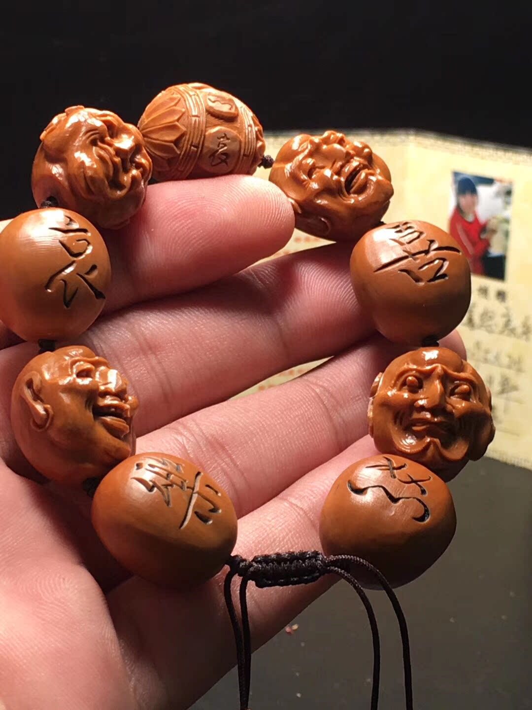 Olive nuclear carving joys and sorrows hand string Su Gong famous Liu Ping iron core pure hand carving olive Hu hand man