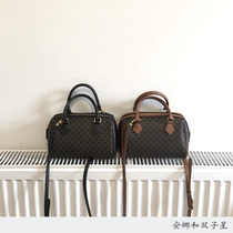 caramel chocolate Dont look at its tiny actually super-capable cable-carrying Boston bag.