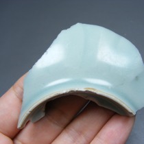 3282 Fragmentary specimen of a small bowl base with lotus petal pattern in Longquan pink-green glaze from the Southern Song Dynasty produced in Hangzhou