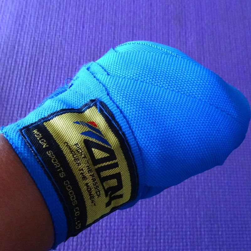 Men boxing wrestling with training handbandages for adult wrestling with three pairs of handbandage