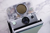 Polaroid Pauli comes in SX70 Sonar transparent shell alpha Love Book once imaging mint green
